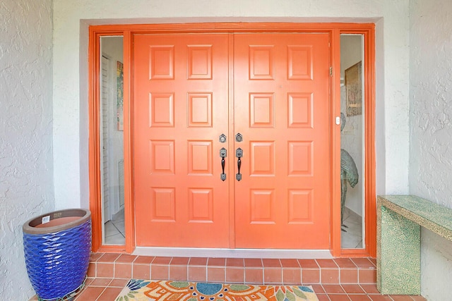 property entrance featuring a garage