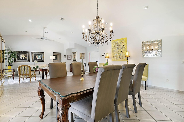 tiled dining room featuring vaulted ceiling and ceiling fan with notable chandelier