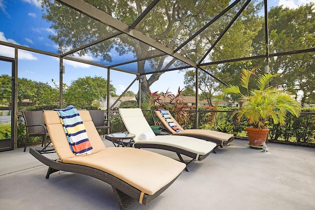 view of patio / terrace with a lanai