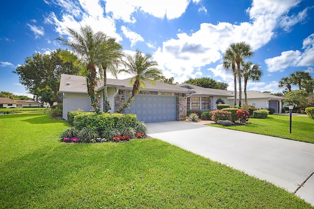 ranch-style house with a garage, concrete driveway, stone siding, and a front lawn