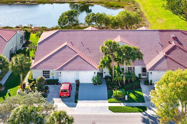 drone / aerial view with a water view