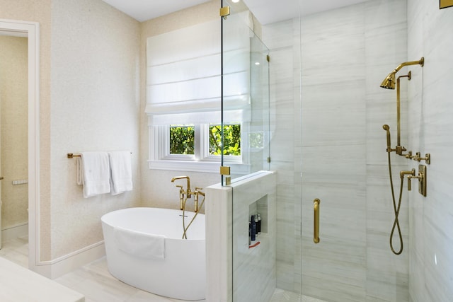 bathroom with separate shower and tub and tile patterned floors