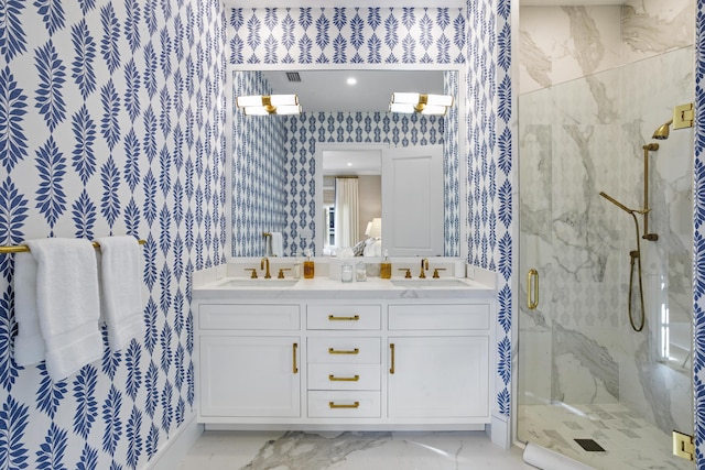 bathroom featuring vanity and an enclosed shower