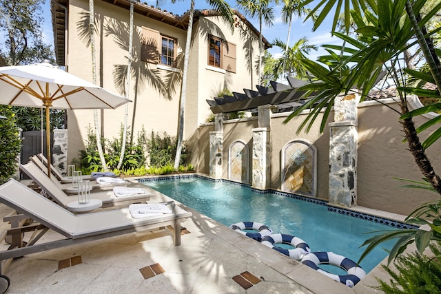 view of pool featuring a patio