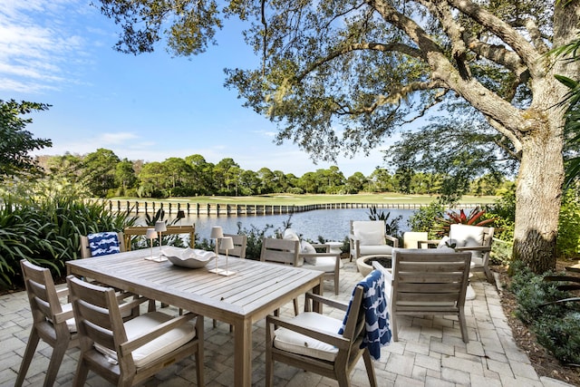 view of patio with a water view