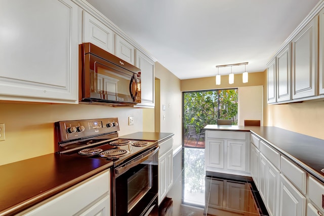 kitchen featuring white cabinetry and black appliances