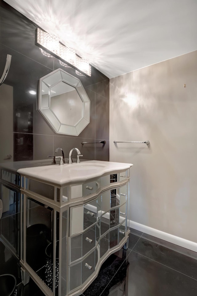 bathroom with sink and tile patterned flooring