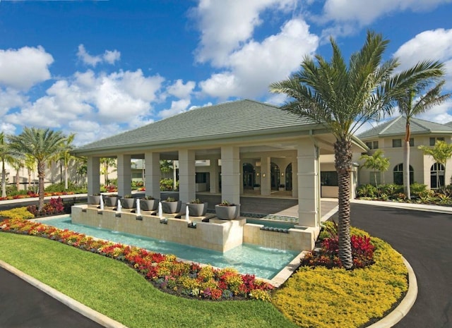 view of pool with pool water feature