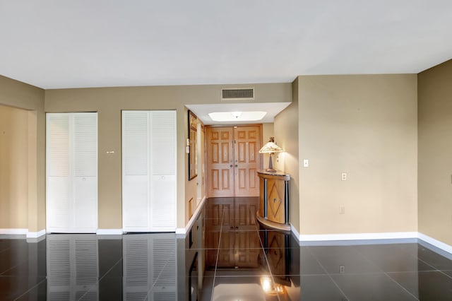 stairs with tile patterned flooring