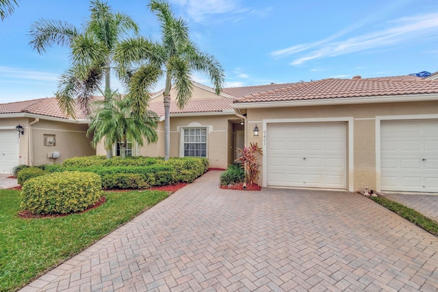 view of front of home with a garage