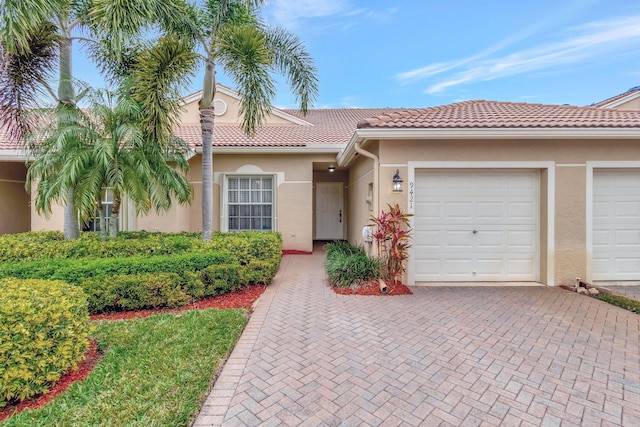 view of front of home with a garage