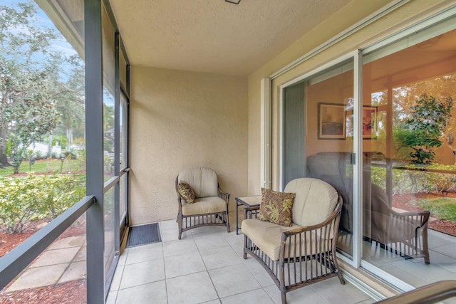 sunroom / solarium with a healthy amount of sunlight