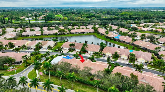 drone / aerial view with a water view