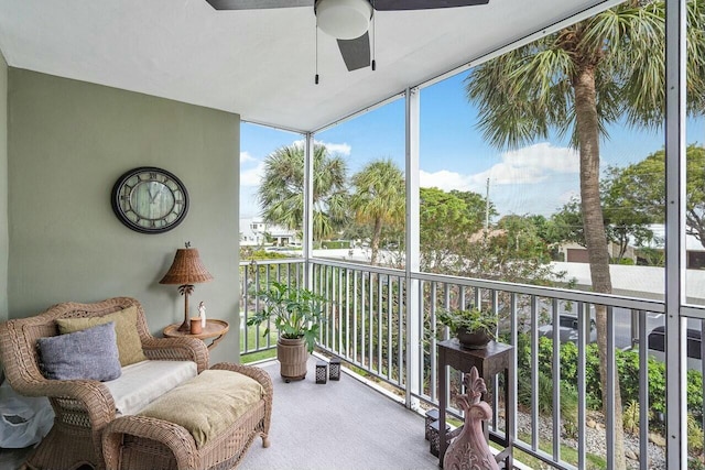 sunroom with a wealth of natural light and ceiling fan