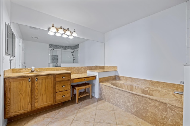 bathroom featuring tile patterned flooring, vanity, and shower with separate bathtub