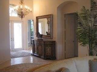 entrance foyer featuring a chandelier