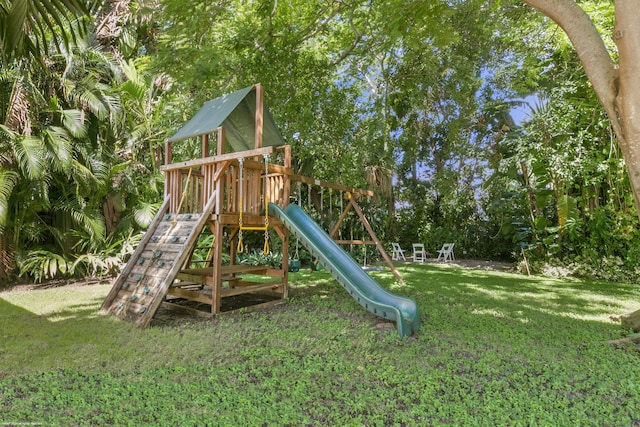 view of playground featuring a lawn