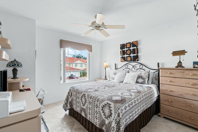 bedroom featuring ceiling fan and light tile patterned flooring