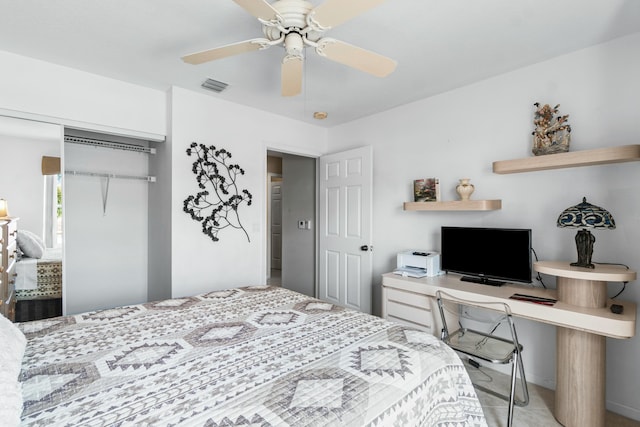 bedroom with ceiling fan and a closet