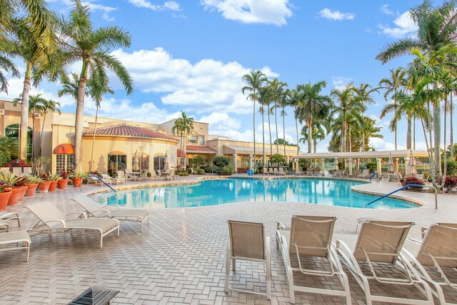 view of swimming pool featuring a patio