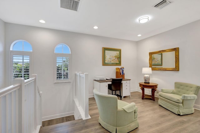 living area featuring light hardwood / wood-style floors