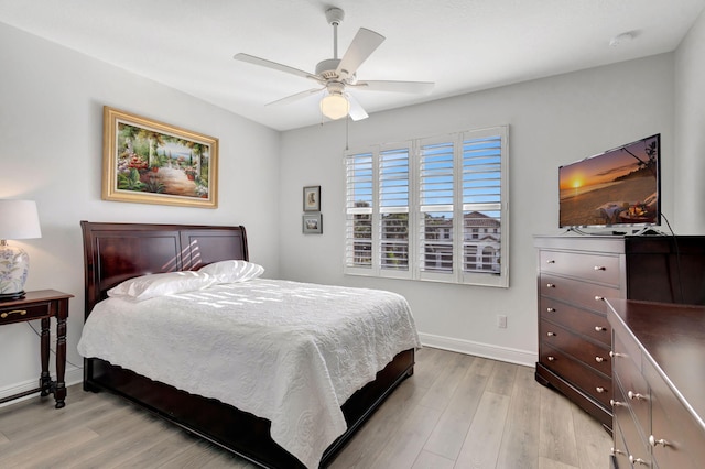 bedroom featuring ceiling fan and light wood-type flooring