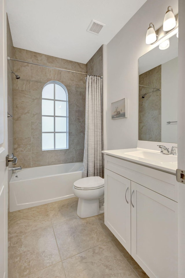 full bathroom with tile patterned flooring, vanity, toilet, and shower / bathtub combination with curtain