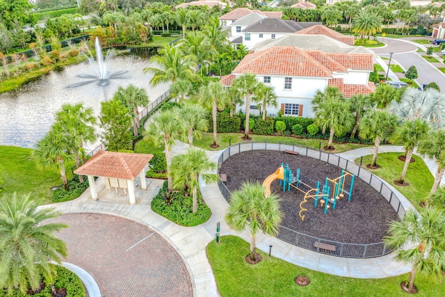 birds eye view of property featuring a water view