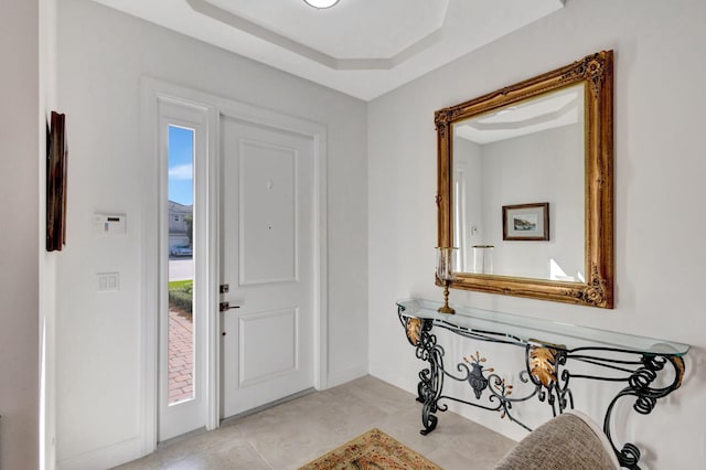 foyer with light tile patterned floors