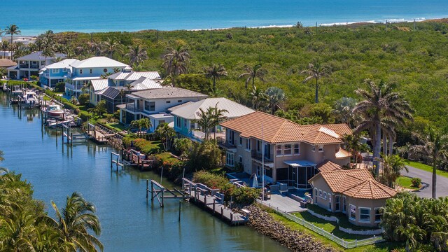 drone / aerial view featuring a water view