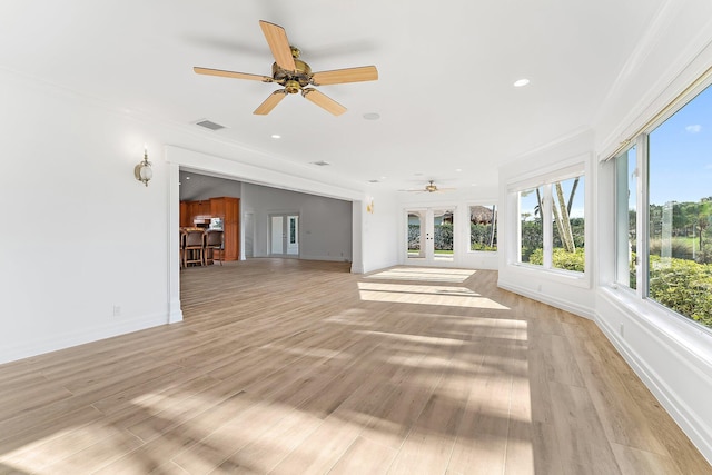 interior space featuring french doors and ceiling fan