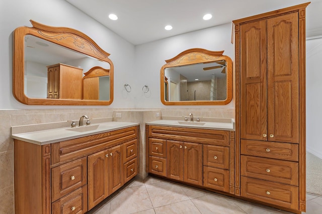 bathroom with tile patterned floors and vanity