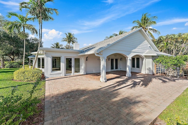 back of property with french doors