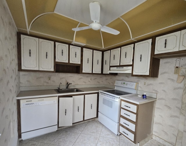 kitchen featuring white cabinetry, white appliances, sink, and light tile patterned floors