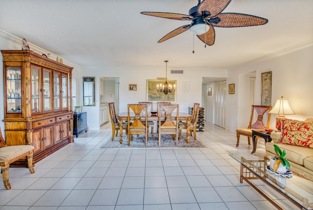 dining space featuring a textured ceiling, light tile patterned floors, ceiling fan with notable chandelier, and ornamental molding