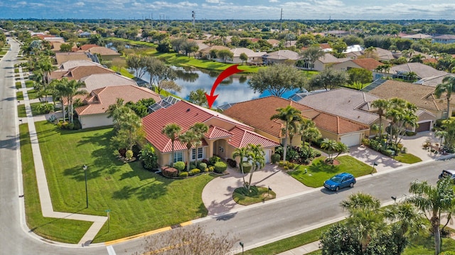 drone / aerial view featuring a water view