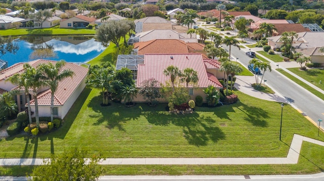 bird's eye view with a water view