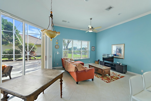 living room featuring ceiling fan and ornamental molding