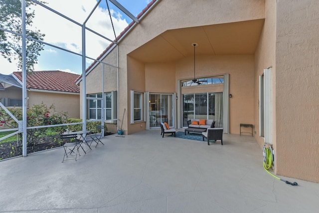 view of patio / terrace featuring outdoor lounge area and a lanai