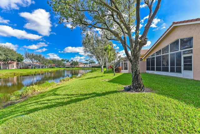 view of yard with a water view