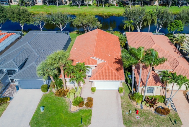 drone / aerial view with a water view