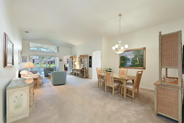 carpeted dining space featuring lofted ceiling and a notable chandelier