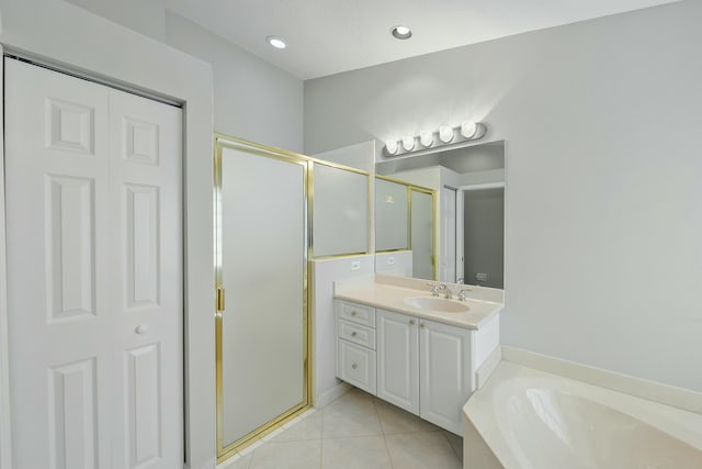 bathroom with vanity, separate shower and tub, and tile patterned floors