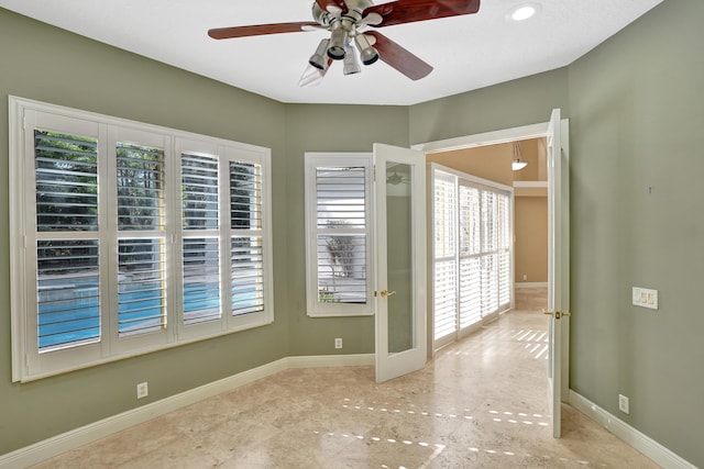 unfurnished room featuring ceiling fan