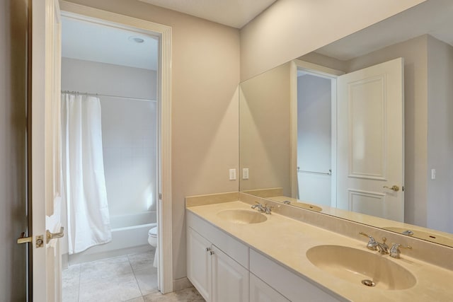 full bathroom featuring tile patterned floors, vanity, shower / bath combo, and toilet