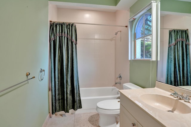 full bathroom with tile patterned floors, vanity, shower / tub combo, and toilet