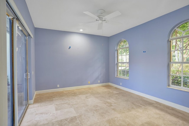 spare room featuring ceiling fan