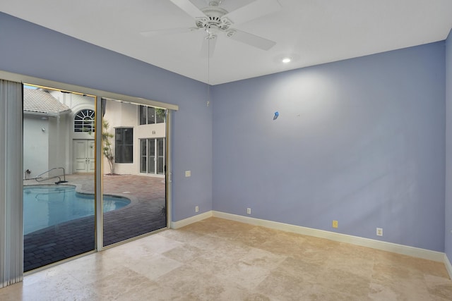 empty room featuring ceiling fan