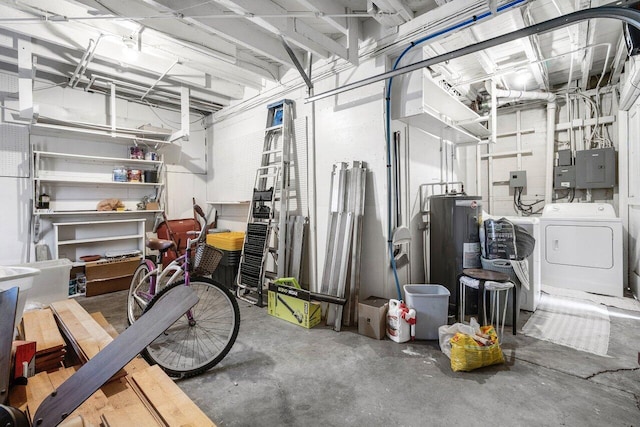 basement with electric panel, water heater, and washer and clothes dryer