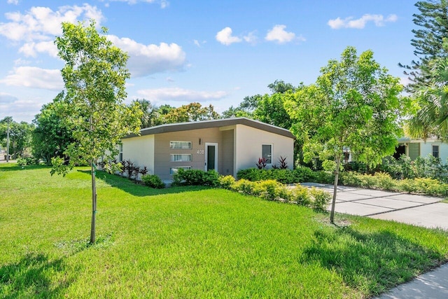 exterior space with a front lawn